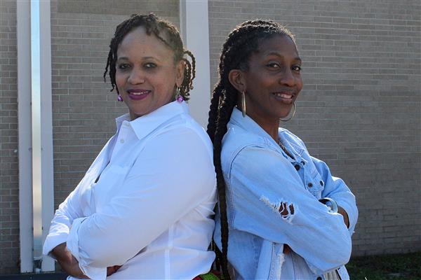  Erin Savage and Ann Sherman-White